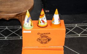 Clarice Cliff Interest - Three Wedgwood Sweet Seduction Range Sugar Casters, comprising 'House &