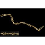 18ct Gold Diamond Set Bracelet, with Ankh cross design, fully hallmarked, 8'' length. Weight 11