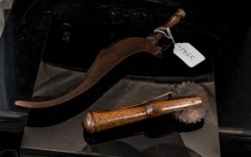 A 19th Century Treen Goose Wing Knitting Sheath with punched wrigglework decoration and a 19th