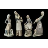 Four Lladro Figurines, comprising Girl with Goose and Puppy, No. 4866, Girl with Bunny 9'' tall,