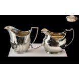 George III Sterling Silver Cream Jug. Hallmark London 1808, Maker Mark Rubbed. Weight 109.1 grams.