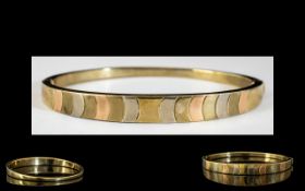 9ct Gold Ladies Bangle. Hallmarked 9ct. Size Approx 2.5 by 2 Inches. Weight 13.4 grams.