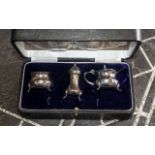 Silver Cruet Set In Original Box. All Stamped for Silver. Blue Glass Liner Intact. All Pieces have
