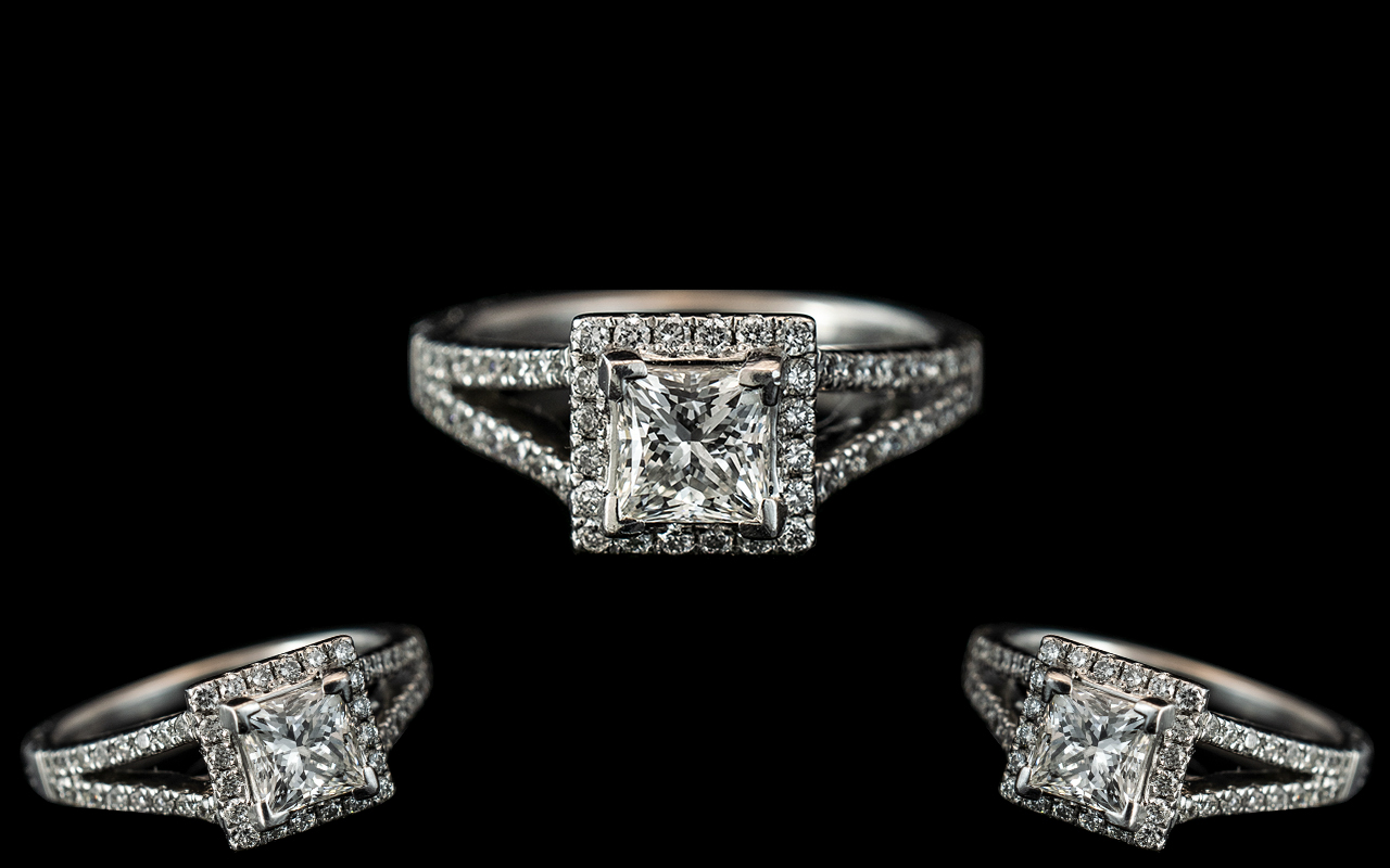 Platinum - Superb Split-Set Diamond Set Dress Ring. The Central Princes Cut Diamond Surrounded by