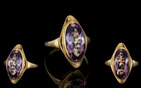 9ct Gold Attractive Boat Shaped Amethyst Set Dress Ring. Marked 9.375. The Faceted Amethyst of