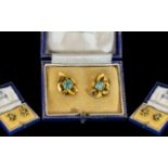 A Ladies Fine Pair of 18ct Gold Blue Zircon Set Earrings, Flower head Design. Est 1.50 ct to Each