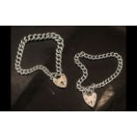 Two Sterling Silver Link Bracelets, with heart shaped lockets, both fully hallmarked. Weight 35.5