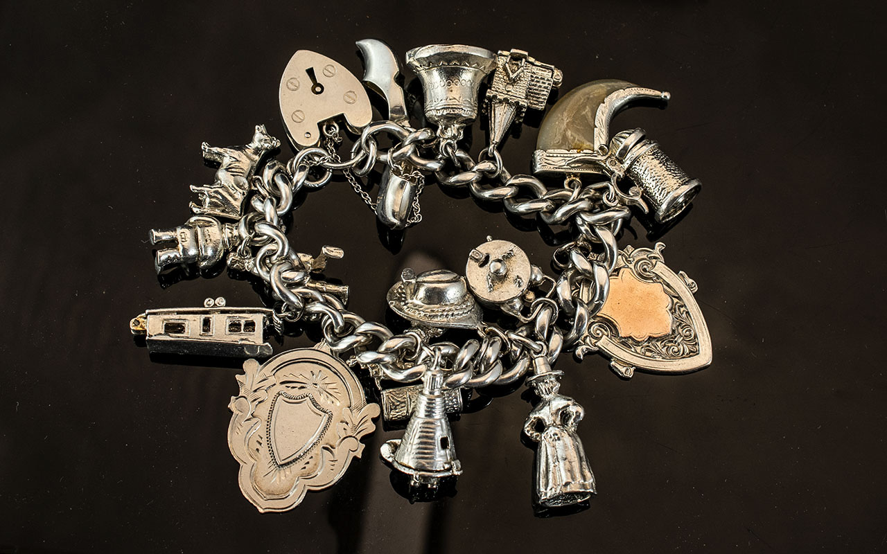 Ladies Silver Charm Bracelet, Clasp Is Hallmarked and Some Charms Also. Charms Includes Bell,