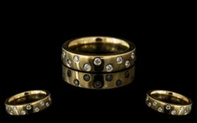 9ct Gold 16 Diamond Set Eternity Ring, fully hallmarked, ring size H. Weight 4.80 grams.