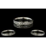 Platinum Half Eternity Ring, channel set with 12 princess cut diamonds, fully hallmarked. Ring