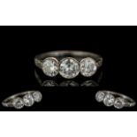 18ct White Gold - Good Quality Ladies 3 Stone Diamond Ring. The Pave Set Round Diamonds of Top
