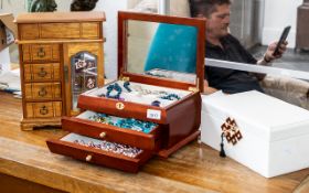 Three Quality Jewellery Boxes, comprising a wooden inlaid box withy mirror interior and two drawers,