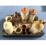 A collection of earthenware 3 bed warmers, 1 jug, pork dipping jar, egg cups laddel/spoons, jar,