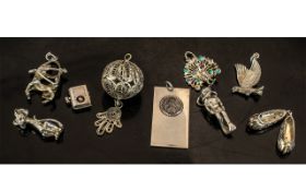 Good Collection of Vintage Sterling Silver Charms & Pendants, nine in total, various sizes and