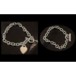 Sterling Silver Bracelet, Tiffany style, with heart charm, toggle fastening, weight 25.8 grams.