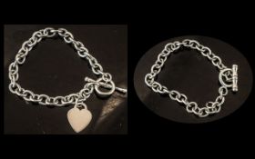 Sterling Silver Bracelet, Tiffany style, with heart charm, toggle fastening, weight 25.8 grams.