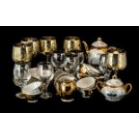 A Bavaria Gilt Teaset comprising teapot, 12 saucers, 11 cups, milk and sugar. Together with 4