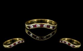 Ladies 18ct Gold Ruby and Diamond Set Dress Ring. Hallmark for 18ct - 750 to Interior of Shank.