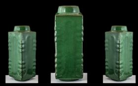 A Chinese Archaic Style Sectional Vase, of moulded form in a green glaze. Height 9.5''.