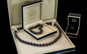 Ladies Black Pearl Necklace and Matching Bracelet & Ring Set. Bought From Peter Sarchet Jewelers,