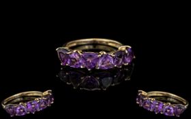 Ladies - Attractive 9ct Gold Six Stone Amethyst Set Ring. Full Hallmark to Interior of Shank. All