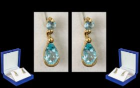 Ladies Pair of 9ct Gold Attractive Aquamarine Set Earrings. The Tear Drop Shaped Earrings of Good