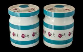 Pair of Portmeirion Pottery Lidded Storage Pots, white ground with blue stripes and floral rose