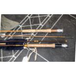 Fishing Interest - Two Fishing Rods in a Canvas Holder, to include a Hardy 275 cm. Together with a