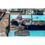 Bronze Art Deco Style Figure of a classical male with a bow, on a square stepped base. Height