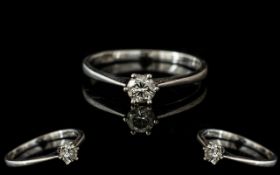 Platinum Single Stone Diamond Ring, set with a round modern brilliant cut diamond, claw set, fully
