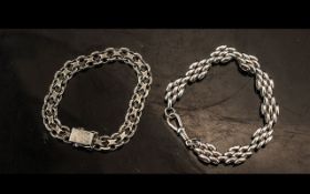 Two Fancy Link Silver Bracelets, one with cross and circular stye, with open box fastening, and