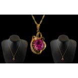 Ladies 9ct Gold Attractive Strung Pink Stone Set Ornate Pendant Attached to 9ct Gold Fancy Chain.