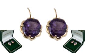 Ladies 18ct Gold Attractive Pair of Amethyst Set Earrings. The Faceted Amethyst of Excellent Rich