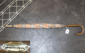 Vintage Burberry Umbrella, traditional style, wooden handle. 33'' long, gold Burberry plaque to