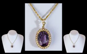 An Antique 15ct Gold Amethyst and Seed Pearl Pendant, large central amethyst approx. 20 x 15 ml,