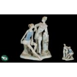 Nadal Spanish Porcelain Figural Group, a ballerina and a Pierrot clown measures 14''.