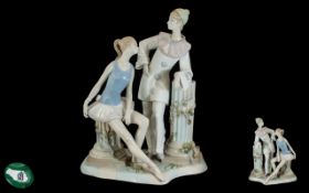 Nadal Spanish Porcelain Figural Group, a ballerina and a Pierrot clown measures 14''.