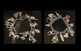 Vintage Pair of Good Quality Sterling Silver Charm Bracelets - Loaded with 32 Silver Charms. All