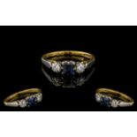 18ct Gold Attractive 3 Stone Sapphire and Diamond Set Dress Ring. Marked 750 - 18ct. Ring Size I,