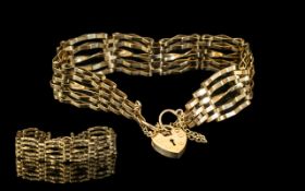 9ct Gold Ladies 5 Gate Bracelet - With Heart Shaped Fastener and Safety Chain. Stamped 9ct. Weight