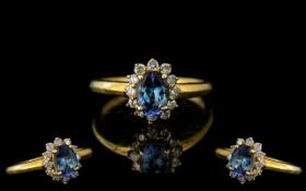 Ladies 18ct Gold Attractive Sapphire and Diamond Cluster Ring, Flower head Design. Marked 18ct to