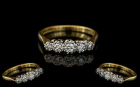 A Diamond Set Five Stone Ring. Centering