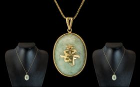 A Vintage 9ct Gold - Jade Set Pendant of Oval Form,