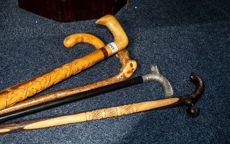 Collection of ( 5 ) Walking Sticks, One With Silver Plate Fancy Design Handle.