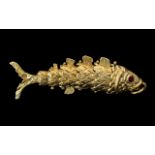 A Large Reticulated 9ct Gold Fish Figure of Excellent Quality. Marked 9ct. 2,5 Inches - 6.