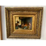 Oil Painting on Panel, housed in a gilt frame, depicting a father in a mask teasing his children.