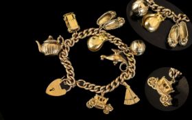 Ladies 9ct Gold Charm Bracelet Loaded with Eight Good Quality 9ct Gold Charms ( All Interesting )