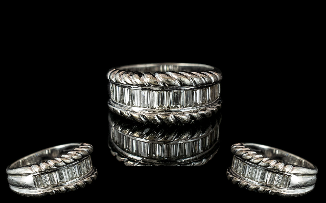 18ct White Gold - Attractive Diamond Set Half Eternity Ring. Marked 750 -18ct.