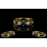 18ct Gold - Attractive 3 Stone Sapphire / Diamond Set Ring with Open Shoulders.