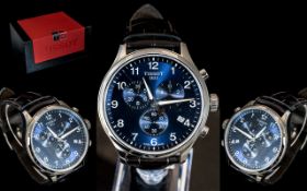 A Gents Tissot Wristwatch Quartz Movement Large Stainless Steal Case, Blue Dial.